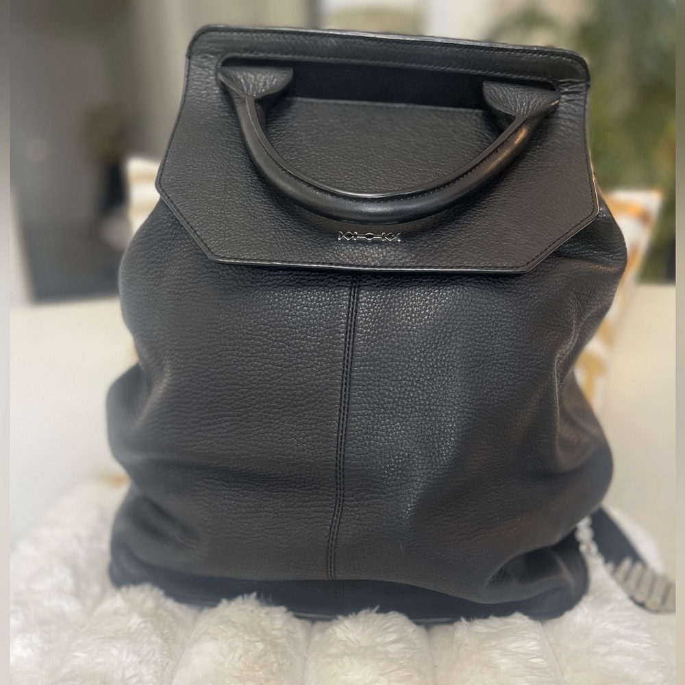 Auth ALEXANDER MCQUEEN Black LEATHER Backpack W/ Silver Bullet-like Hardware.